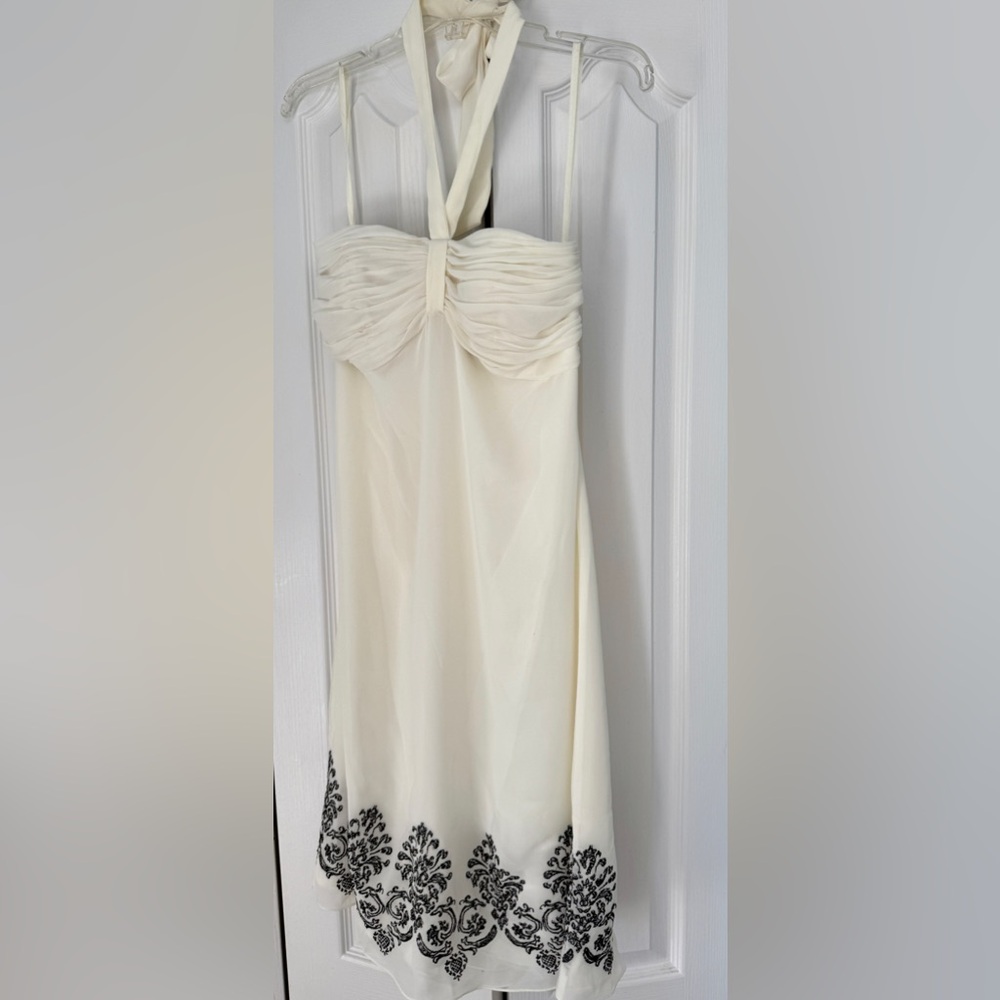Elegant Backless White Dress with Black Detailing